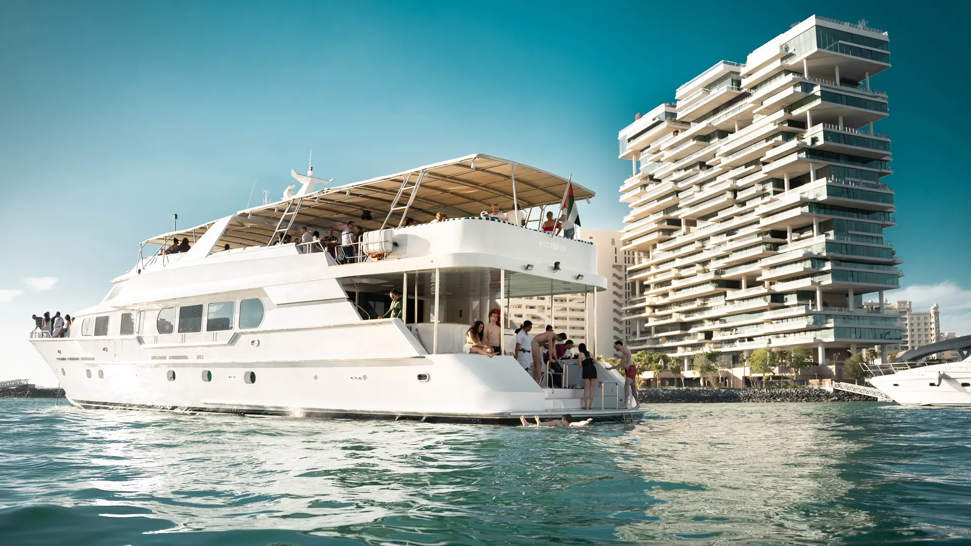 people enjoying in a luxury yacht booking in dubai